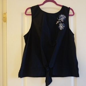 Womens sleeveless blouse with knit back